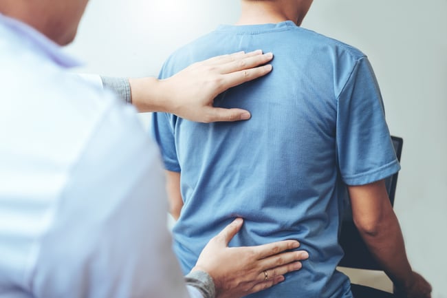 What is involved in spinal rehabilitation?