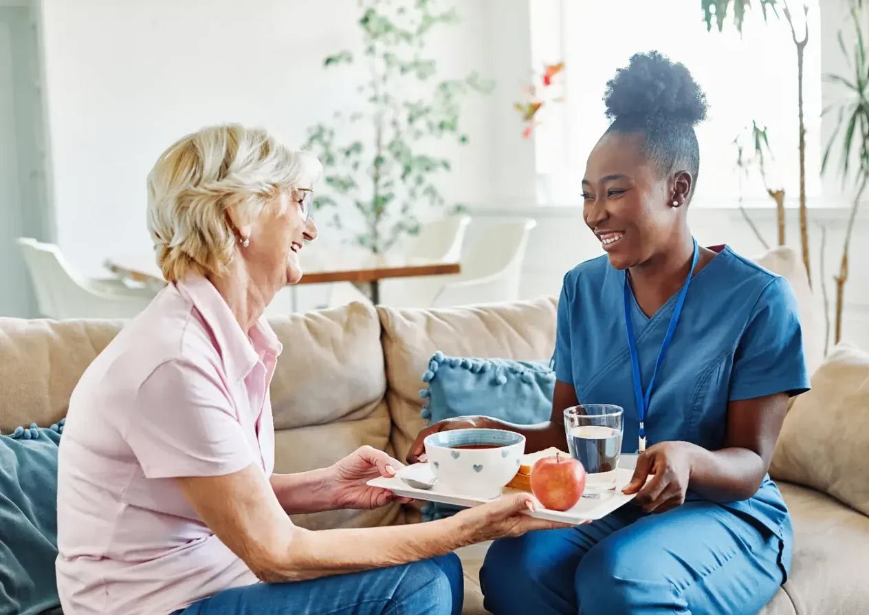 nurse and patient smiling